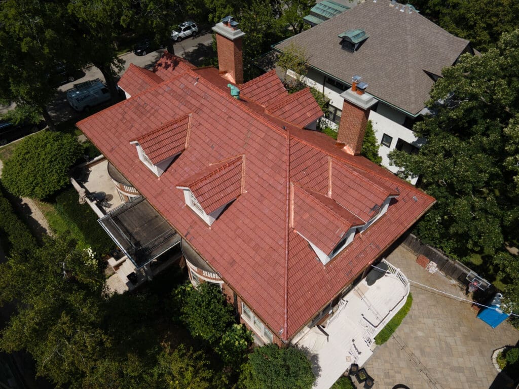 Aerial view of historic tile roof reset and restoration in Evanston Illinois